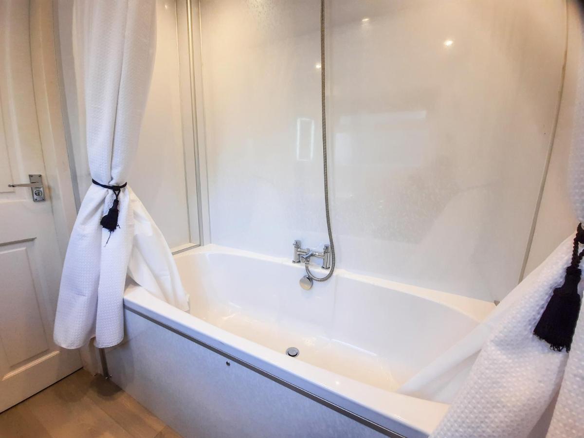 Bwthyn Ger Afon Riverplace Cottage 布莱奈费斯蒂尼奥格 外观 照片