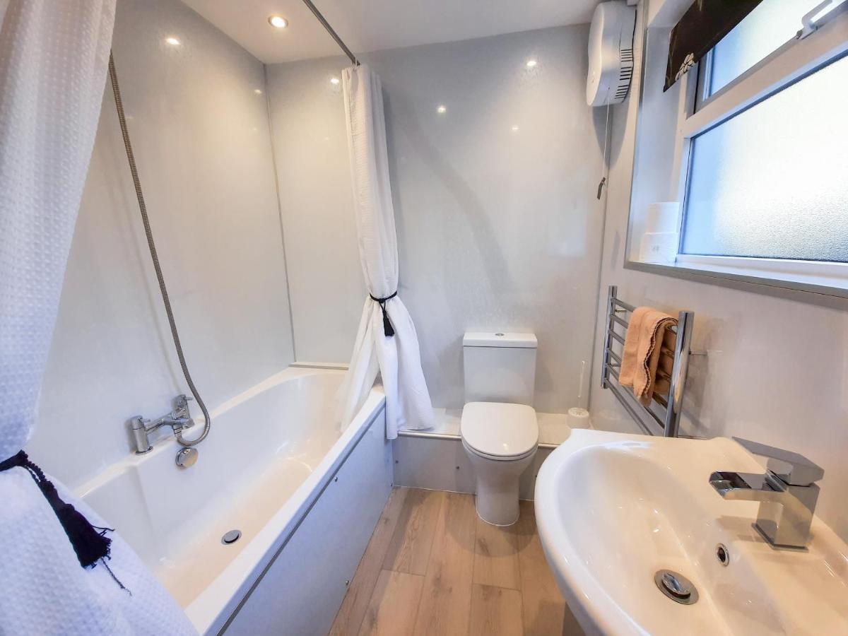 Bwthyn Ger Afon Riverplace Cottage 布莱奈费斯蒂尼奥格 外观 照片